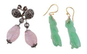 A pair of carved jadeite ear pendants , the jadeite panels carved as gourds, with gold coloured