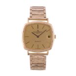 Baume & Mercier, Baumatic, ref. 37069, a gold bracelet wristwatch, no. 460194, import mark for 18