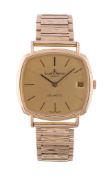 Baume & Mercier, Baumatic, ref. 37069, a gold bracelet wristwatch, no. 460194, import mark for 18