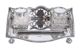 A late Victorian silver inkstand by James Deakin and Sons, Sheffield 1898, with a pierced
