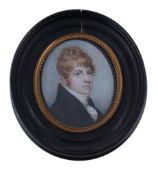 Ω English School, circa 1815 Portrait of a ginger haired young man Watercolour on ivory 6.3cm x 5.