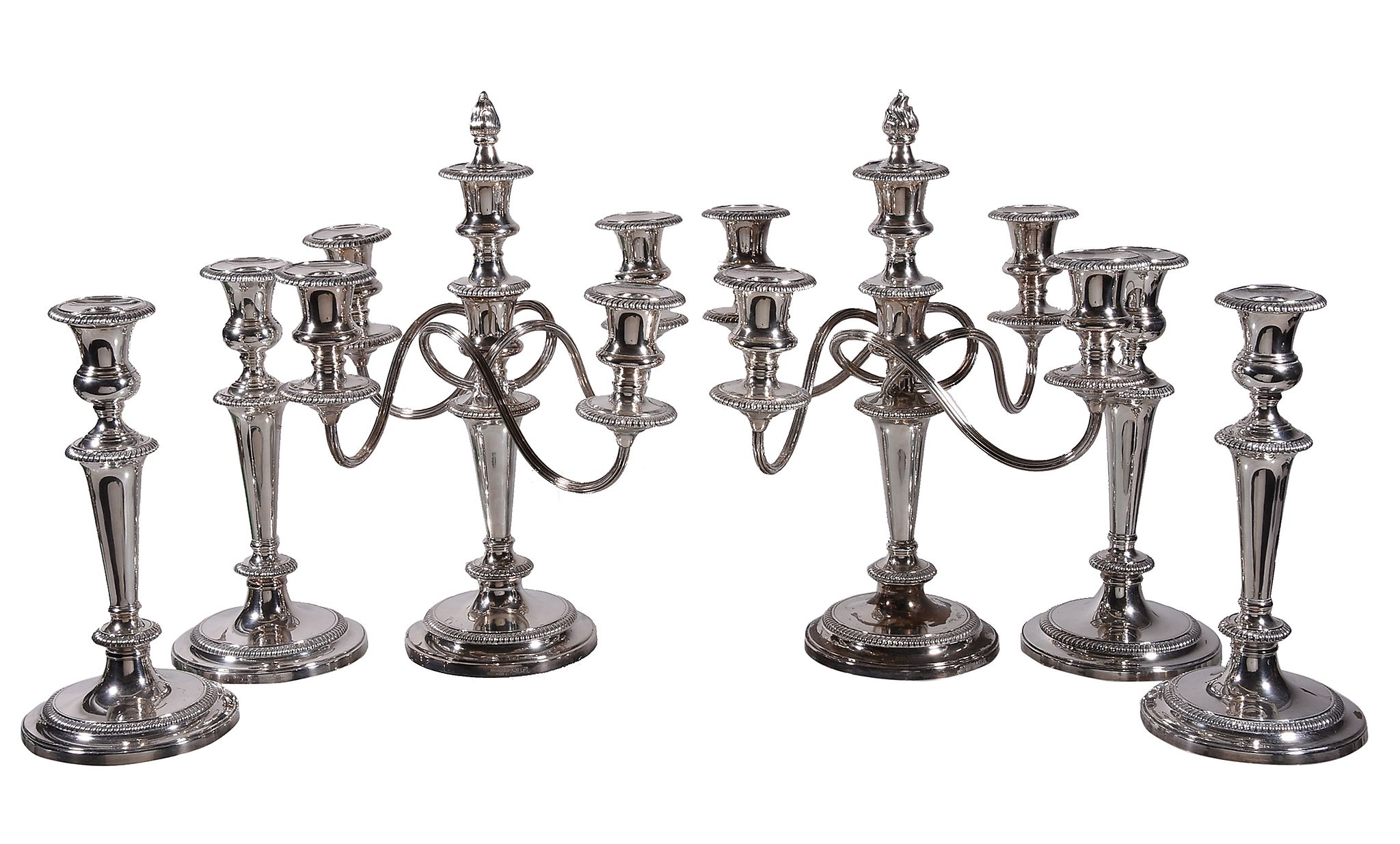 A pair of electro-plated four light candelabra and four candlesticks, stamped Garrard & Co. Ltd.,