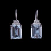 A pair of aquamarine and diamond earrings, the rectangular cut aquamarines below a brilliant cut