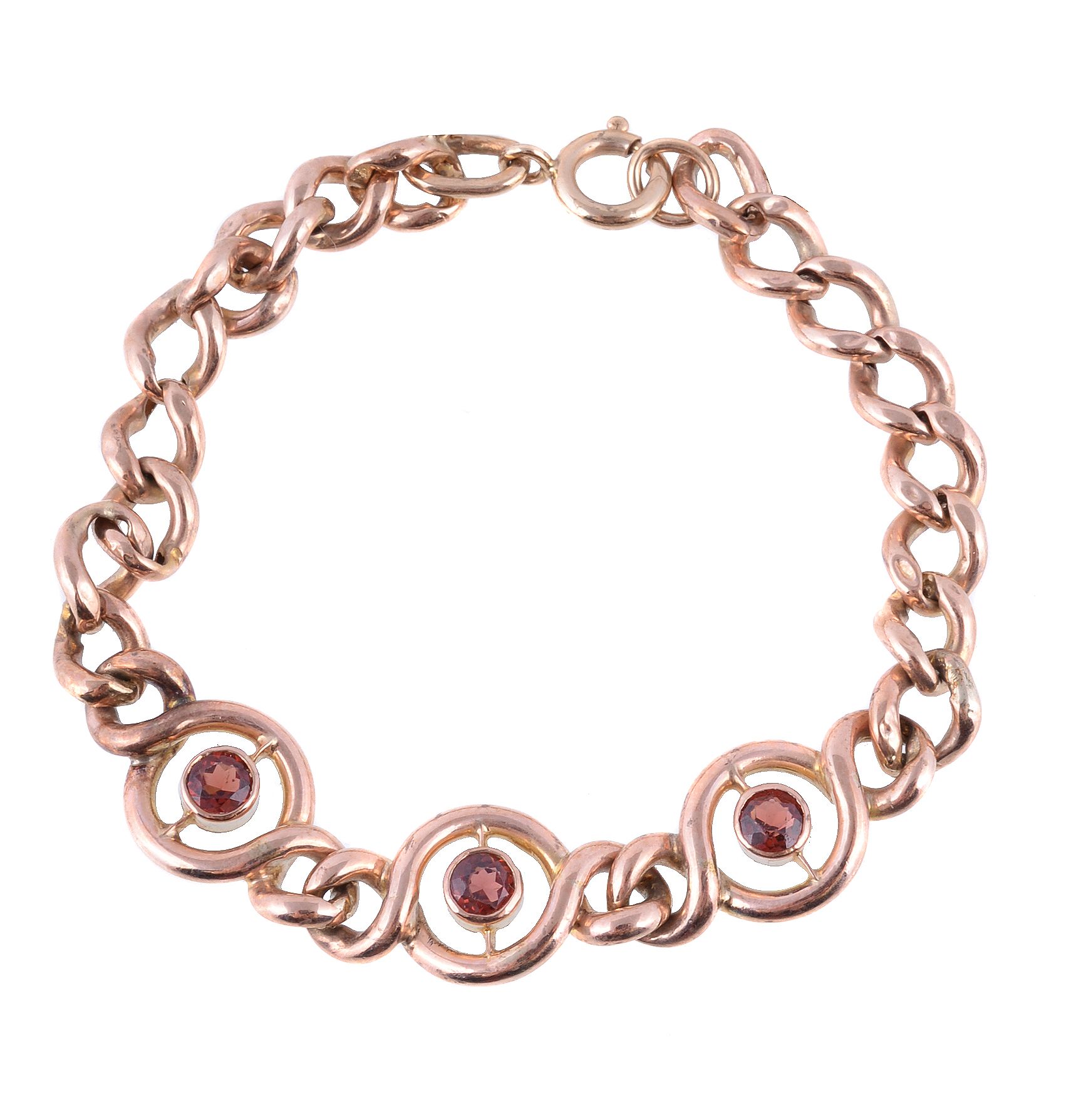 An early 20th century garnet bracelet, the polished curb links set with three circular cut garnets,