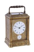 A fine French engraved gilt brass gorge cased petit sonnerie striking small carriage clock with