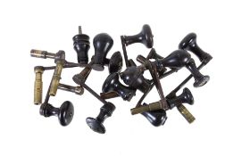 Twelve longcase and table clock crank winding keys with turned ebony handles Anonymous, mid 18th