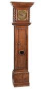 A rare William and Mary oak thirty-hour longcase clock The dial with engraved initials J.W.,