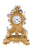 A French Louis XV style ormolu and porcelain mantel clock Raingo Freres, Paris, third quarter of
