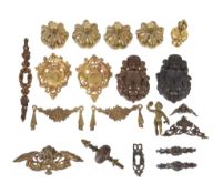 A group of early English pattern cast brass clock case mounts Anonymous, late 17th century and