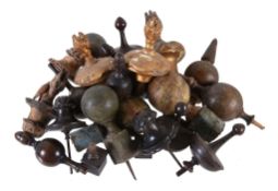 A quantity of wooden longcase clock finials Anonymous, early 18th century and later Including some