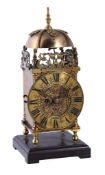 A Victorian lacquered brass miniature lantern clock with passing strike Unsigned, circa 1880 The