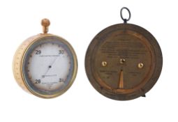A gilt brass aneroid barometer and a brass weather forecasting calculator Negretti and Zambra,