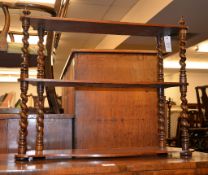 A Victorian stained hardwood set of wall hanging shelves, possibly for campaign use, circa 1860, the
