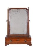 A George III mahogany dressing mirror, circa 1780, with single frieze drawer to platform base,