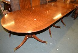 A mahogany dining table in Regency style, last quarter 20th century, 273cm long, together with six