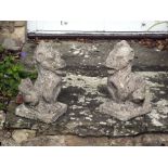 A pair of composition stone models of gryphons, approx 42cm high