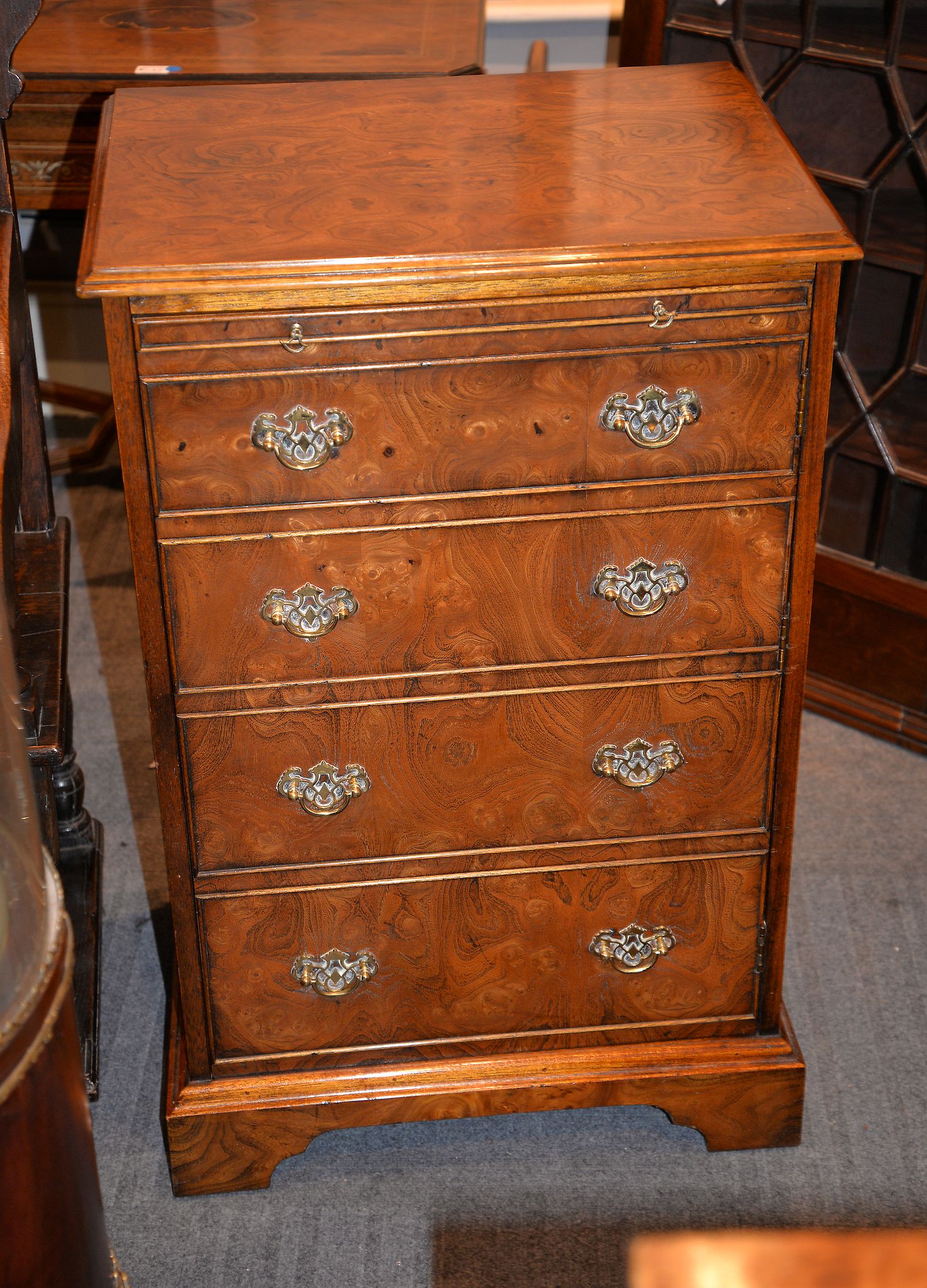 A modern walnut hi-fi cabinet, in the form of a George III dressing chest of drawers, 91cm high,