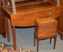 A mahogany teapoy, 56cm high, and a mahogany drop leaf table, 71cm high, the top 95cm x 101cm