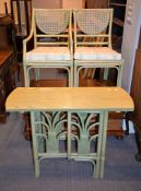 A green stained conservatory table, leaves lacking, 106cm wide, two chairs en-suite, and a similar