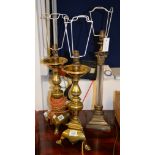 A pair of brass table lamps modelled as 17th century pricket sticks, 20th century, 48cm high