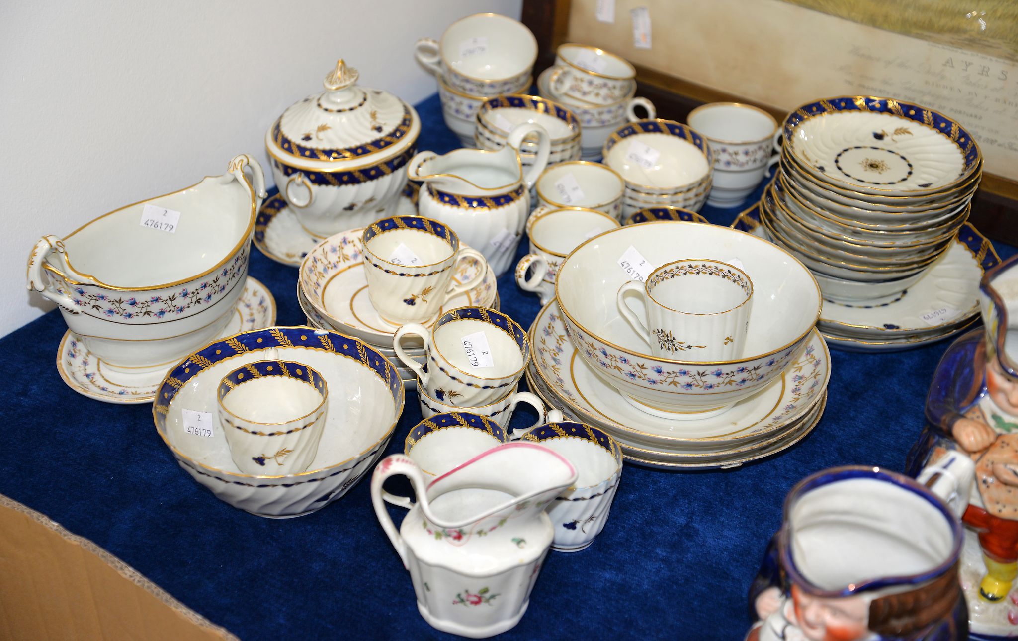 A selection of mostly Worcester porcelains, circa 1800; and a New Hall type helmet jug