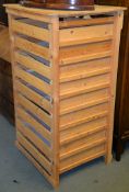 A modern pine apple chest, with nine slides, 137cm high, 75cm wide, 67.5cm deep