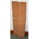 Two wooden carved panels in the manner of Aboriginal examples, depicting figures and animals, each