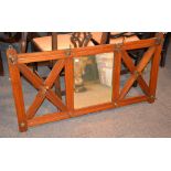 A late 19th century walnut coat rack, with brass hooks and central mirror