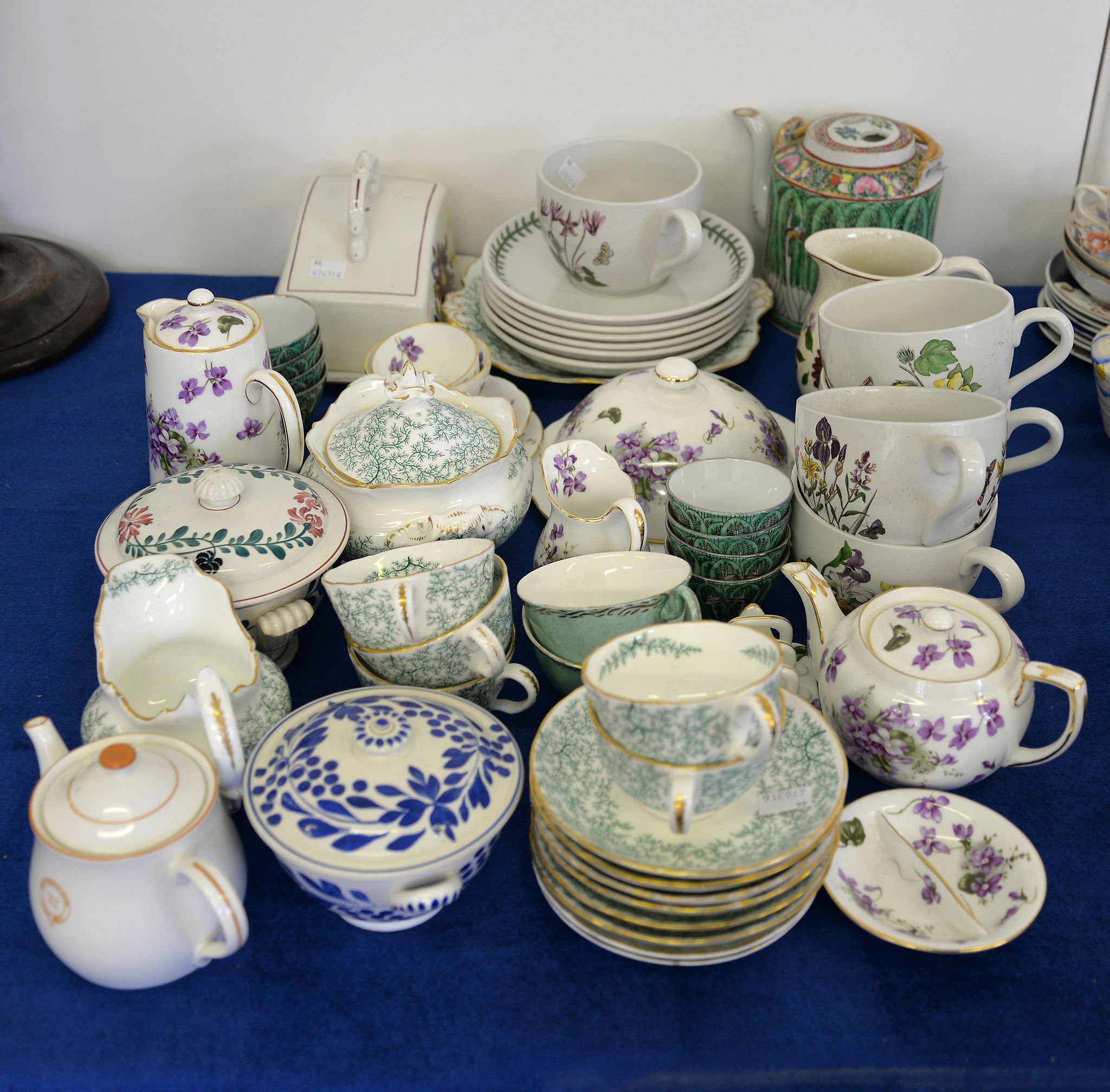An assortment of mostly English pottery and porcelain teawares, including a modern Cantonese tea pot