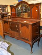 A mahogany sideboard, first half 20th century, with arched mirror back, 162cm high overall, 152cm