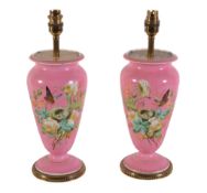 A pair of gilt metal mounted porcelain urns fitted as table lamps, 20th century, the inverted