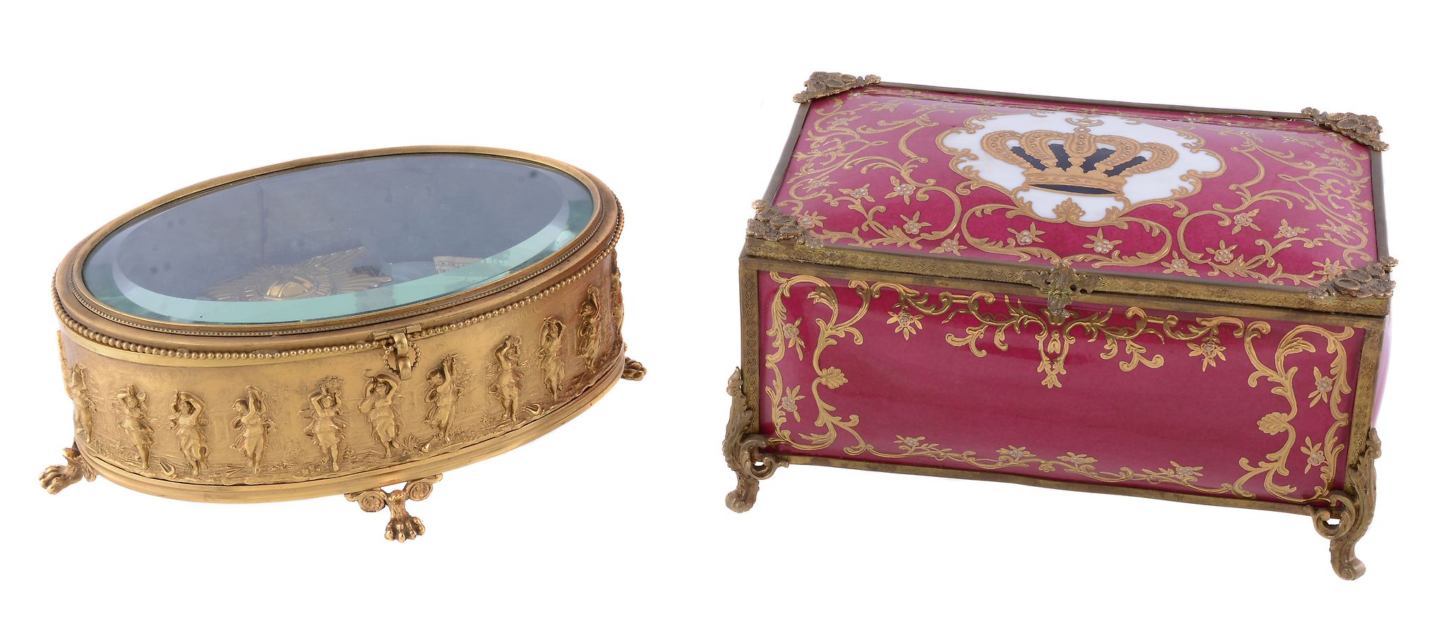 A Continental gilt-metal and glass oval casket, early 20th century, stamped with a frieze of dancing