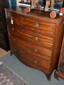 A Regency mahogany bow front chest of drawers, with two short and three long graduated drawers,