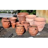 A pair of basket weave terracotta pots, and a pair of terracotta Weston pots Provenance: The