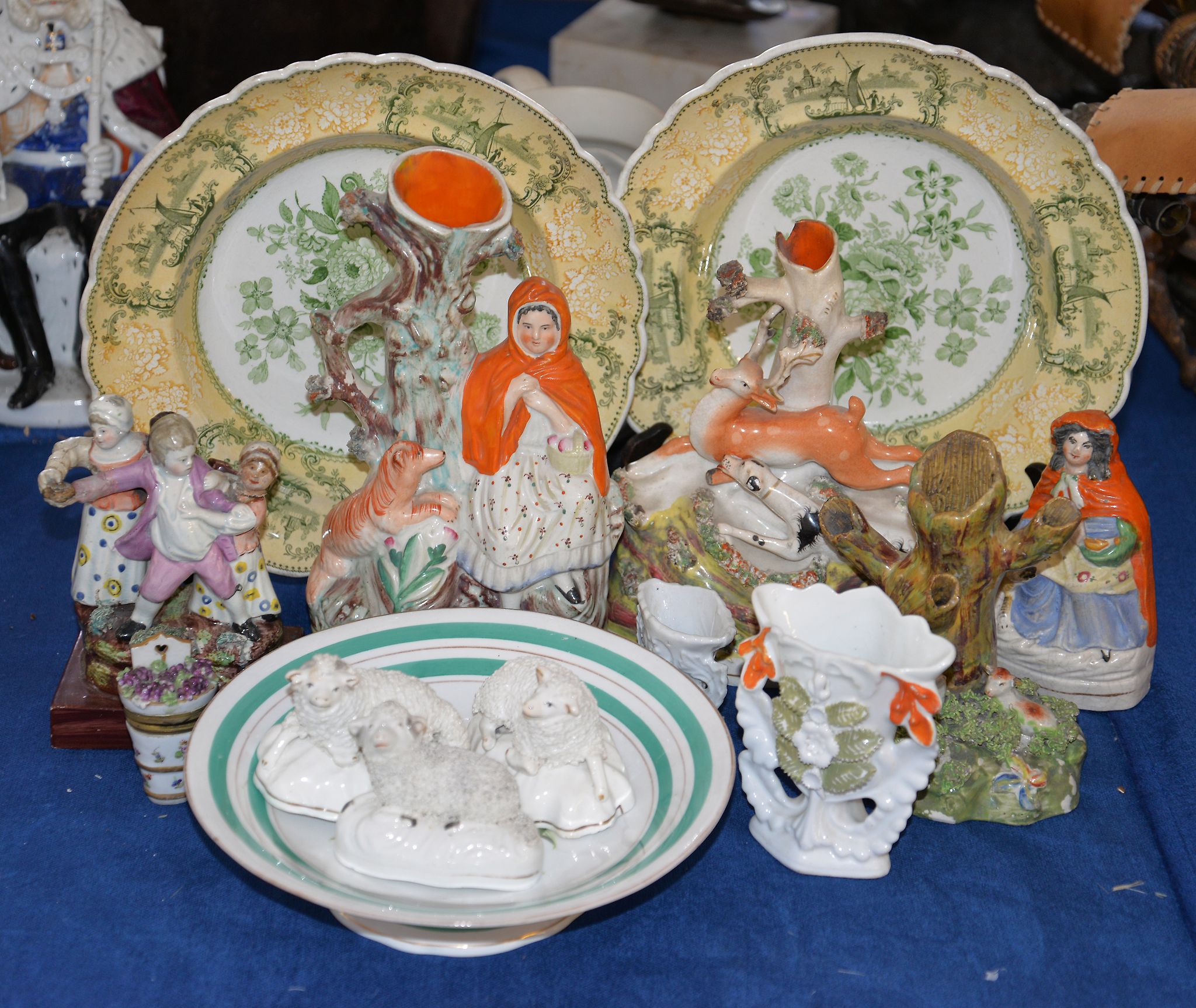 An assortment of Staffordshire figures and other items