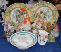An assortment of Staffordshire figures and other items