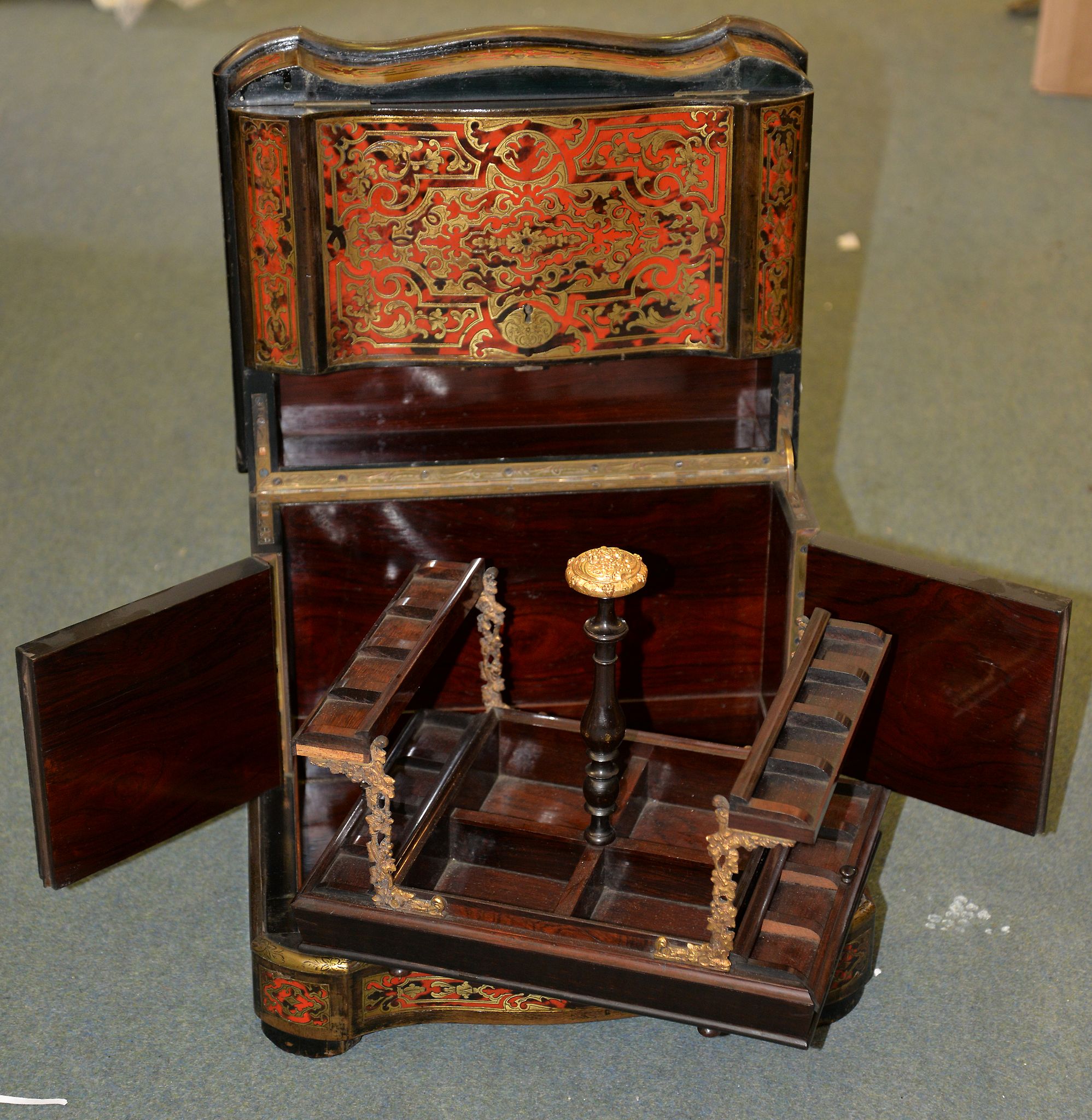 Ω A Napoleon III boule inlaid tortoiseshell cave a lacquer, with removable rosewood decanter