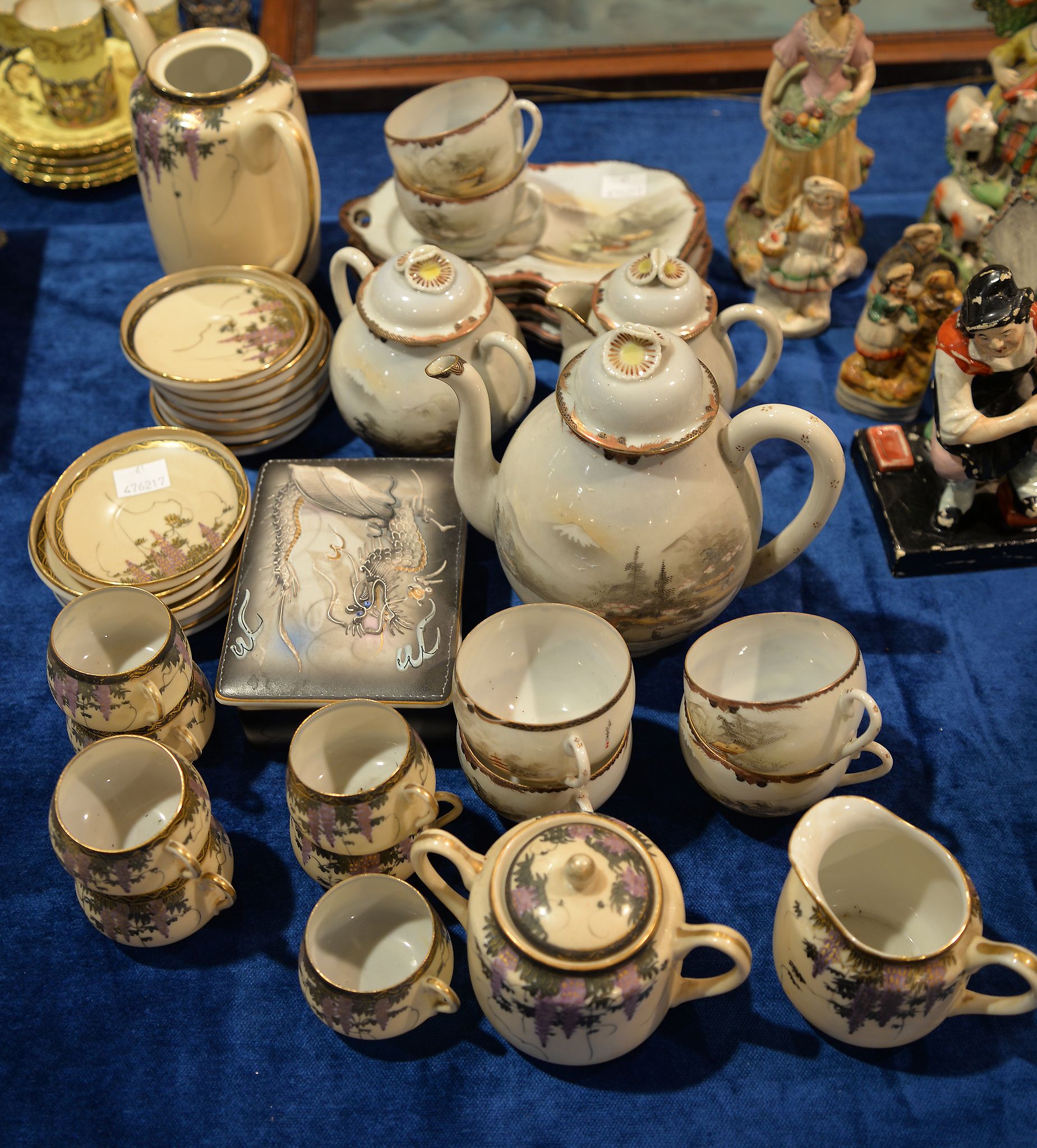 Two Japanese part tea and coffee services, and a cigarette box and ashtray