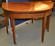 A George III mahogany D-shaped card table, with recent playing surface, 68cm high, 91cm wide