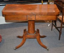 Ω A Regency mahogany and rosewood banded pedestal card table, 74cm high, 92cm wide, 45cm deep