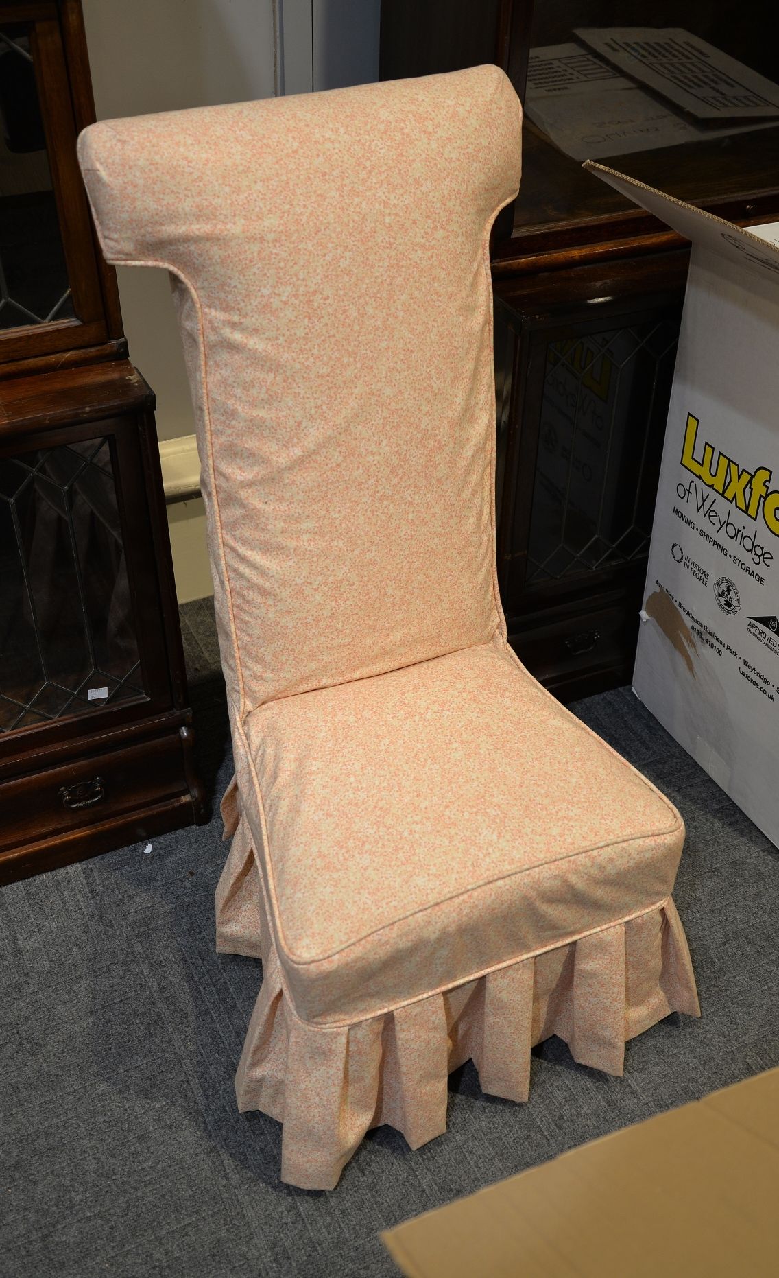 A Victorian ebonised prie-dieu, with mottled pink loose covers, 102cm high