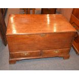 An oak mule chest in George III style, including some period timbers, the hinged lid enclosing