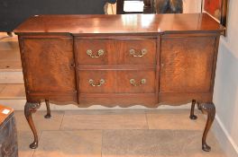 A mahogany sideboard in George II style, second half 20th century, with two cupboard doors