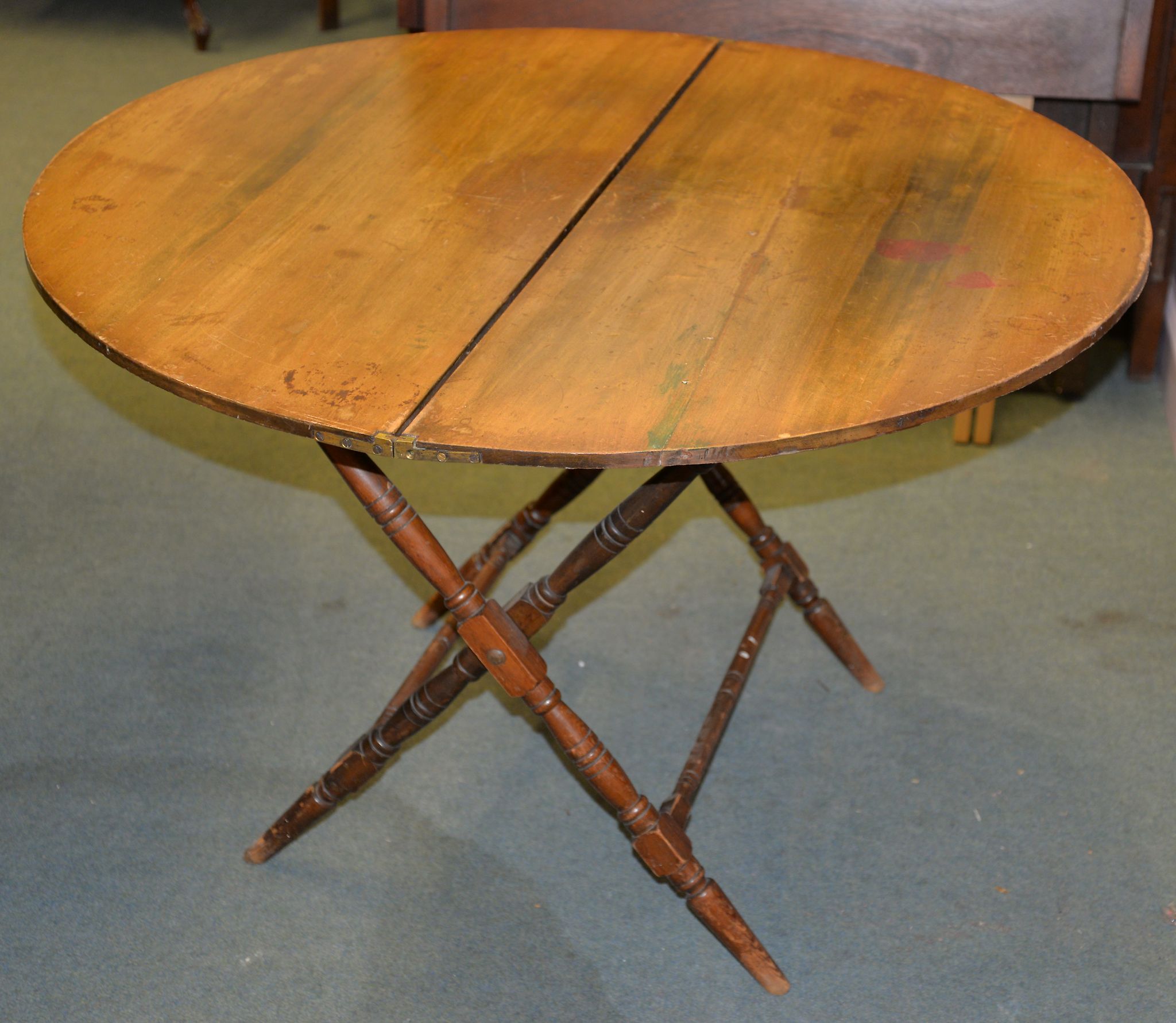 A stained wood coaching table with ivorine plaque for THORNTON & HERNE, 99cm diameter, and three