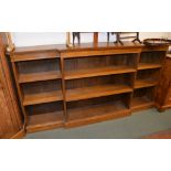 An oak breakfront bookcase with adjustable shelves, 112cm high, 214cm wide overall, 33cm deep