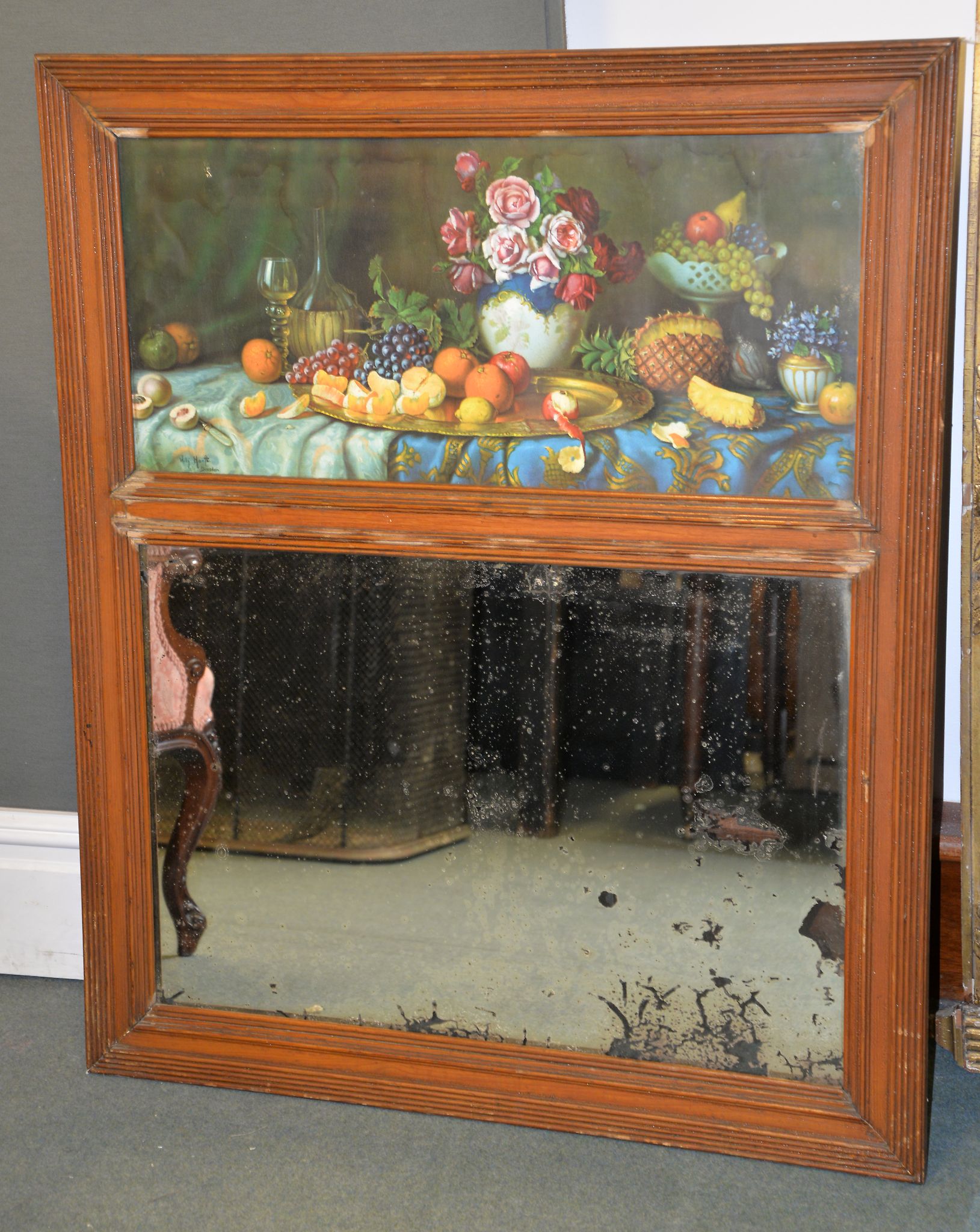 A trumeau style overmantle mirror, with a print of a still life above the rectangular mirror 109cm