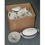 A box containing various part teasets, including Royal Albert 'Old Country Roses', Wedgwood -