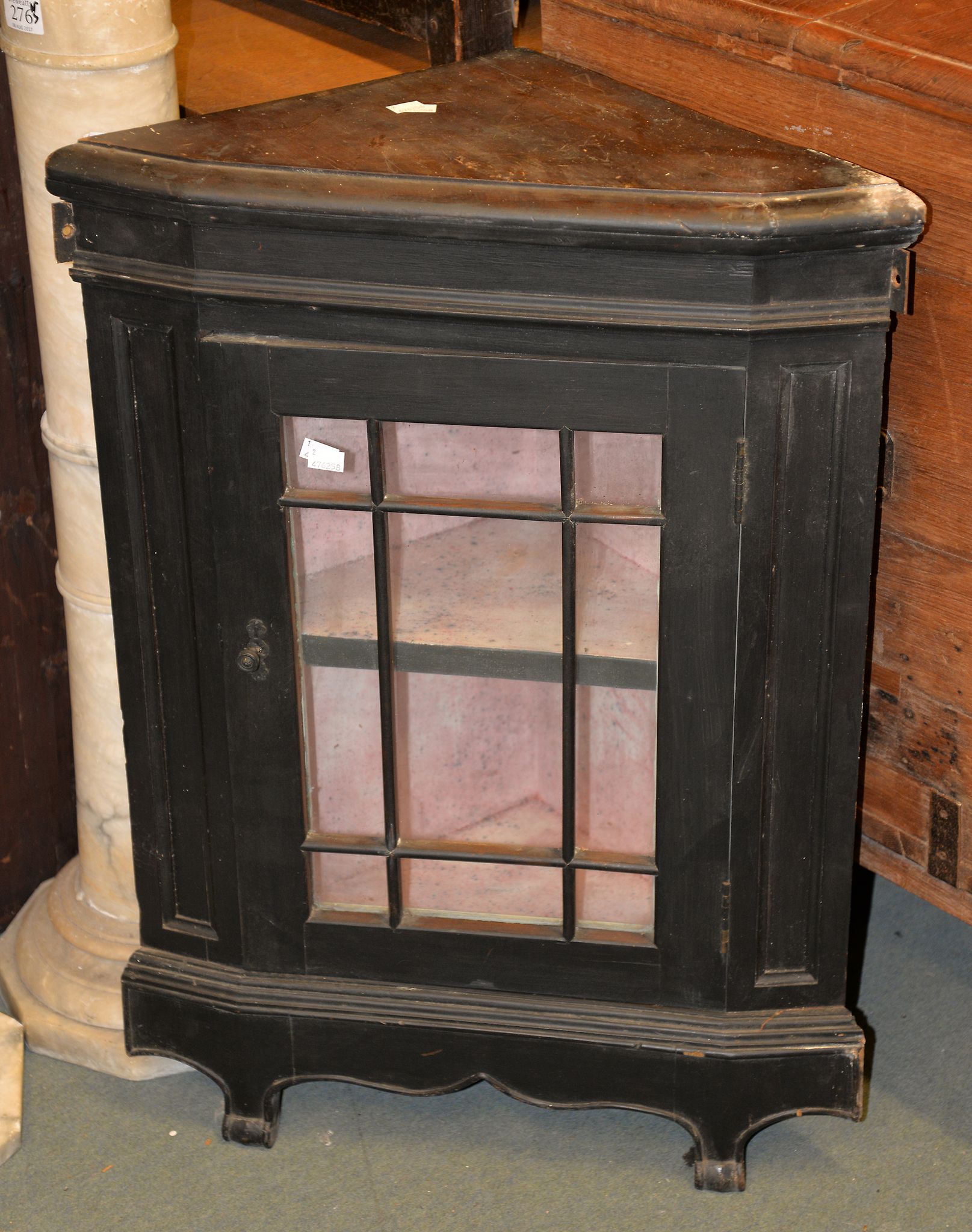 A small stained wood floor standing corner cupboard, and a larger wall mounted example