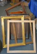Ω A collection of thirteen various vacant picture frames to include a rosewood and a birds eye maple