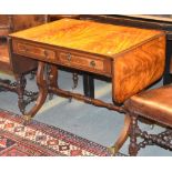 A mahogany sofa table in Regency style, 20th century Provenance: The collection of the late Ronnie